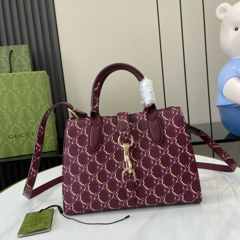 G*u*i top handle bags